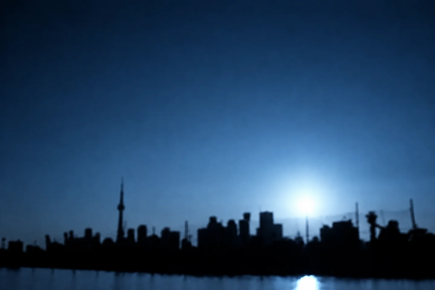 Surhay’s blue-tinted photograph of the Toronto skyline and CN Tower at sunset