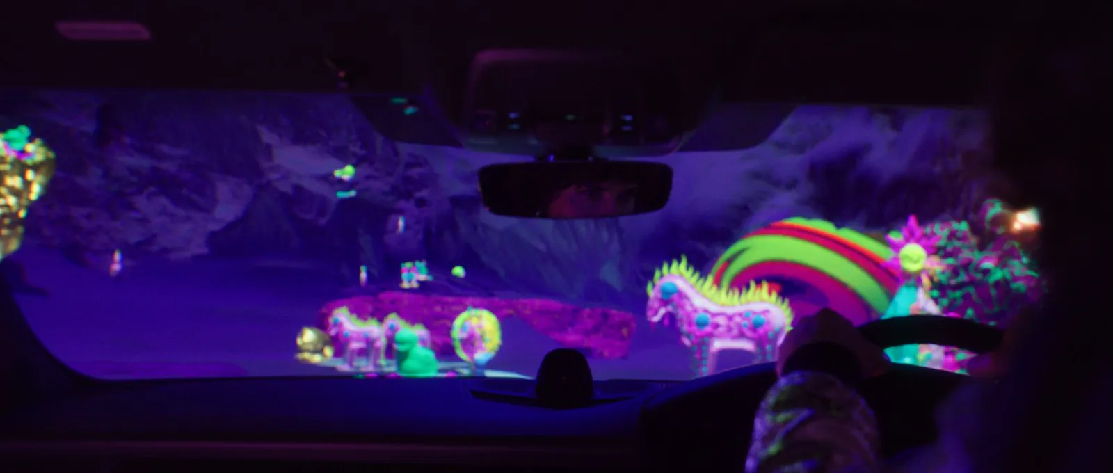 The Porsche travels through a colourful virtual environment